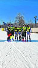 The Pope John XXIII Regional High School boys ski racing team placed third in the overall state championships Feb. 24-26 at Mountain Creek. The team also was third in the slalom state championship. From left are Lukash Nynka, Harrison Burgess, Ben Parnell, Ethan Poplawski, Matthew Gazzillo and Zachary Hedgepeth. (Photo provided)