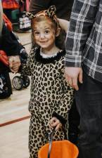 Children dressed up and received treats and played games in the gym at Sparta Evangelical Church recently.