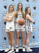 Seniors Brynn McCurry, Ally Sweeney and Bailey Chapman are captains of the Sparta High School girls basketball team. (Photo provided)