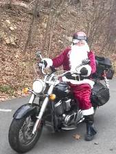Motorcycle Santa hits the road