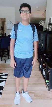 Sparta students start new school year Devansh on his way to sixth grade.