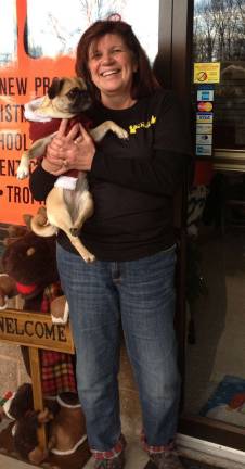 Local opens custom embroidery and engraving store Owner Charlene Malley with her dog.