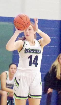 Sussex County's Kristen Burse aims the ball at the hoop just before releasing it during a shot attempt in the third quarter.