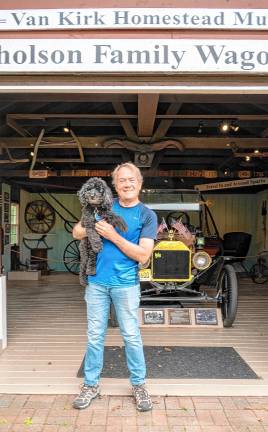 Photos: Earth Day Fair John Baer and his dog Tosha at the Van Kirk Homestead Museum’s transportation exhibit, which was part of the Earth Day Fair.