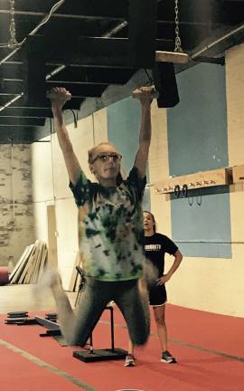 Ninja Warrior gym coming to Newton Ashley Smith, of Stillwater, tackles the "flying squirrel"