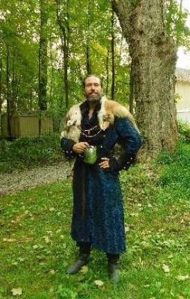 Knights and faeries roam the woods of Sparta King James (James Kimball), property owner and founder of the Sparta Renaissance Festival, took a moment to strike a royal pose