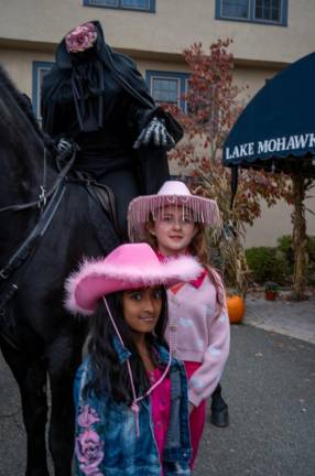 HH3 The Headless Horseman reaches for Abigail and Azme Parisella.