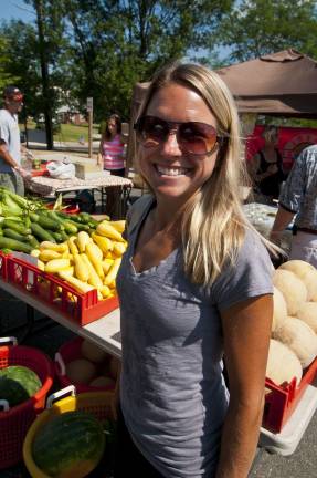 Local sunshine Sparta Farmers Market co-owner Amy DelCoro of Sparta.