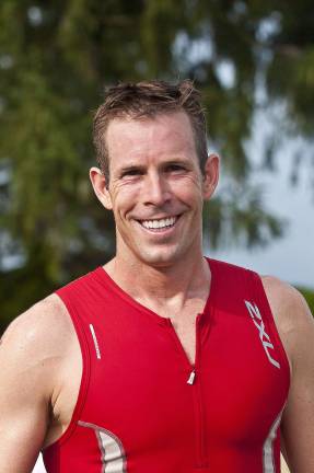 Triathlon draws athletes from 13 states First finisher, Jason Wood of Sparta at the Lake Mohawk Country Club Triathalon, in Sparta, July 28, 2012. Photo by Warren Westura