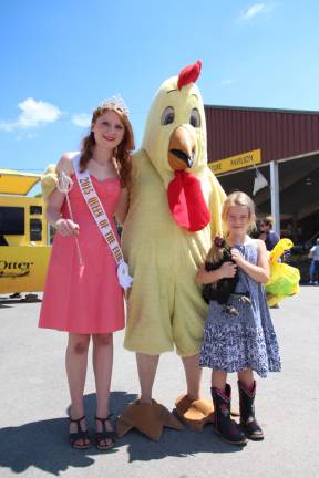 A day at the fair Aimee buchanan, Miss Sparta and Queen of the Fair, Amelia Murphy of Sussex holding Ray the rooster.