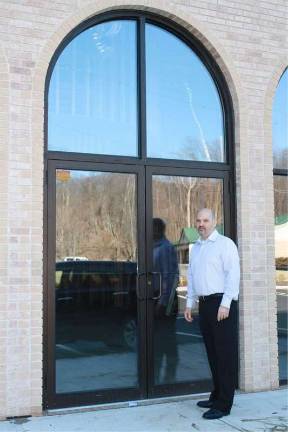 J. Thomas heading to new location Owner Leonard Girardo at the new storefront the Shoppes at Lake Mohawk