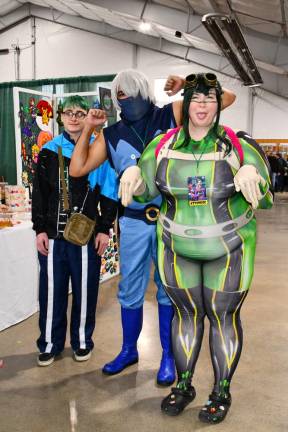 Jessica Passmere, Dylan Van Dunk and Syrus Corter, all of Franklin, in costume. (Photo by Maria Kovic)