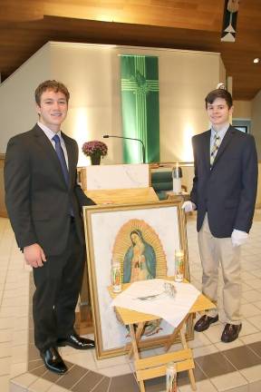 National running of the Silver Rose stops in Sparta Deputy Chief Squire Joe Pauls and Chief Squire Charlie Wyckoff stand proudly on the altar area which displayed the Silver Rose and the painting of Our Lady of Guadalupe. (Photo provided)