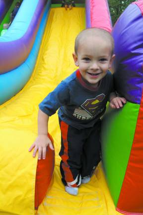 Bounce houses, face painting and more at Sparta Day Gavin Alliegro, 3, of Sparta.