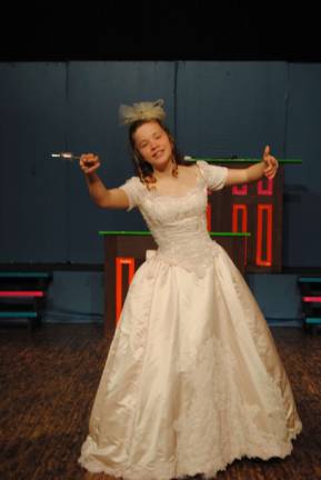 See the show, help wolves Grace Brizek of Sparta is the Fairy Godmother who is the attorney representing The Three Pigs, Little Red and Grandma Hood and the Boy Who Cried Wolf against the Big Bad Wolf in Cornerstone's upcoming production of 'Big Bad Musical.'