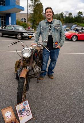 Nick Stewart shows off his 1940 motorcycle. It originally was sold through Sears catalog.