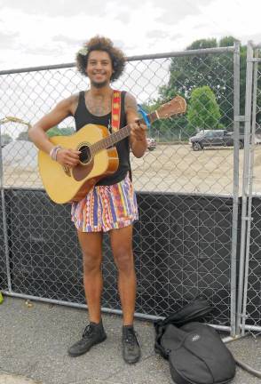 Matt Graney plays the guitar. (Photo by Vera Olinski)