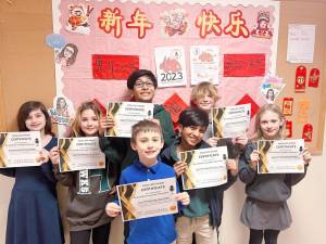 Fourth- and fifth-graders at Hilltop Country Day School in Sparta advanced to the final round of the Chinese song singing contest sponsored by the New Jersey Chinese Teachers Association. Front row, from left, are fourth-graders Jack Barrows and Ahrin Kabse. Back row from left are fourth-grader Charleigh Scotto, fifth-graders Abby Iussig, Arjun Kabse and Jack Iussig, and fourth-grader Petra Shabalina.