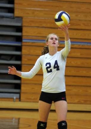 Sparta gets first volleyball win Sparta's Paige Smith about to serve the ball. Smith scored five points and made one ace and one dig.