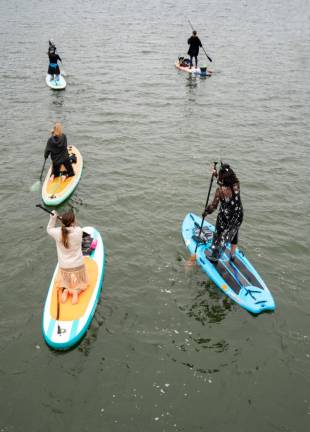 The Witches Paddle proceeds on Lake Mohawk. (Photo by Nancy Madacsi)
