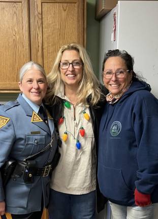 From left are State Trooper Sue Mistretta; Robin Hughes, crisis response team manager at Jersey Battered Women’s Service; and Valerie Macchio, executive director of the Sparta Community Food Pantry.