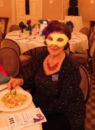 Masquerade Gala helps support the Arts Marion Cuff of The Grace Financial Group enjoys dinner at the Sussex County Arts & Heritage Council's Masquerade Gala on Friday, Oct 11, 2019, at the Lafayette House. Cuff has been a sponsor and supporter of SCAHC for 25 years.