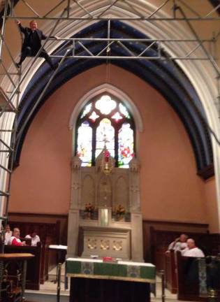 Beloved priest celebrates 30 years Rev. Griner in the scaffolding