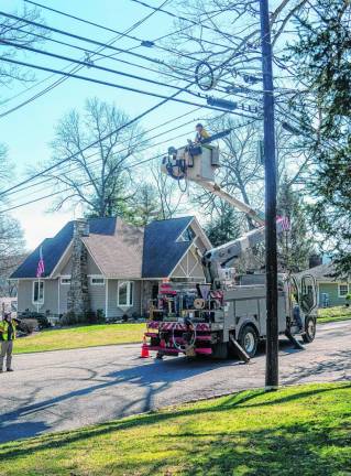 Truck knocks down pole, tree in Sparta