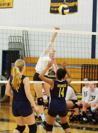 Sparta gets first volleyball win Sparta's Catie Detri leaps and strikes the ball. Detri made 2 kills.
