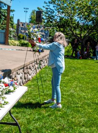 Photos: Memorial Day Parade A wreath is placed during the ceremony.