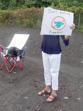 Some protestors concealed their faces from this photographer (Photo by Frances Ruth Harris)