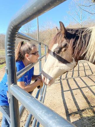 Horse sanctuary needs help to get through the winter Sarge with Rivers Edge founder and president, Diane Romano (Photo by Laurie Gordon)