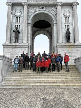 Scout Troop 95 visits Gettysburg Eighteen Scouts and seven adult leaders pose at the Pennsylvania Monument during the 9.8-mile hike on the Billy Yank Trail.
