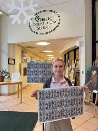 Sparta Independent’s Wrapping Paper Contest is back Isabeau with her artwork printed as wrapping paper in <i>Sparta Independent</i> last year. Photo provided.