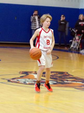 Sparta Stars win basketball tourney championship Lenape Valley's Nate Sarnella handles the ball.