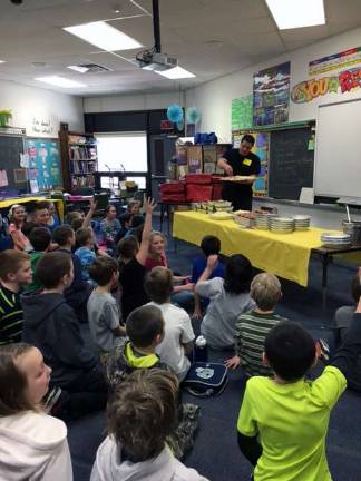 McKeown School fourth-graders top off pizza-slice fraction projects McKeown School fourth-graders top off pizza-slice fraction projects