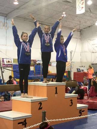 Sparta club gymnasts excel Bronze age 11 Champion Emily Harms and Ainsley Mitchell in 2nd place