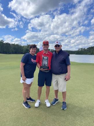 Jack Simon poses with his parents, Marc and Claudine Simon of Sparta.