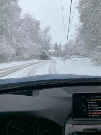 View from inside car on Monday, Dec. 2, 2019. The winter storm brought snow, ice, and downed wires.