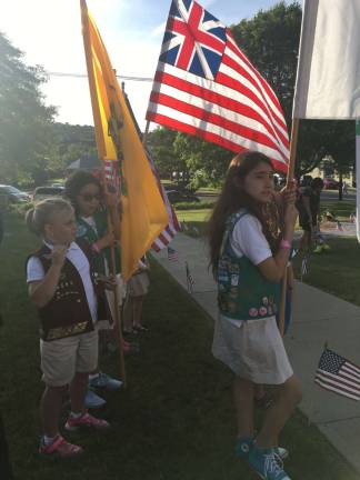 Local girl scouts participated and helped the Elks with their flag history lesson
