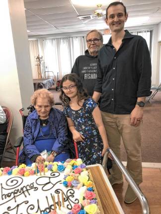 Newton woman turns 107 From left are Jennie Switzer; her great-granddaughter Ava Paladini, 8; her son, Dennis Paladini; and her grandson Brad Paladini.