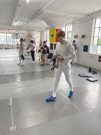 Pope John student wins silver fencing medal Allen Trudnos