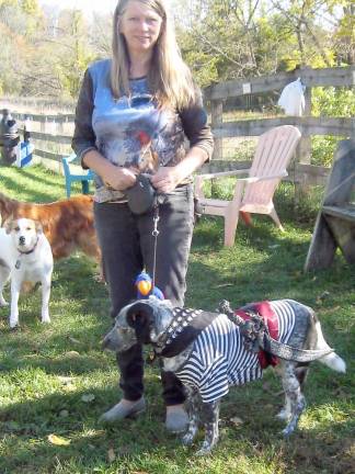 A howlin’ Halloween Parade at Vernon Dog Park Canine pirate Bindy struts with her owner, Judy O'Sullivan (Photo by Janet Redyke)