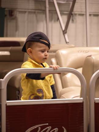 Dylan Clark, 2, of Sparta shopping at the North Jersey Boat Show.
