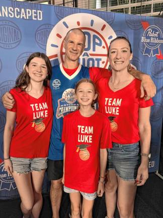 No. 4 in national Pop-A-Shot contest PS1 Luke Kachersky of Sparta enjoys playing the Pop-A-Shot arcade basketball game with his wife, Katie Tracy, and daughters, Ellie, 16, and Hana, 11. (Photos provided)
