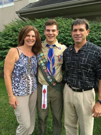 Troop 81 honors new Eagle Scout Eagle Scout Nicholas Krawchuk (center) of Andover Township, poses with his mother, Sandy, and his father, Mark, at his Eagle Court of Honor on September 10, at the Sparta Evangelical Free Church, in Sparta.