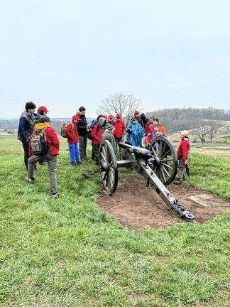 Scout Troop 95 visits Gettysburg Scouts examine a Civil War-era cannon while learning about battlefield tactics used during the Battle of Gettysburg. (Photos provided)