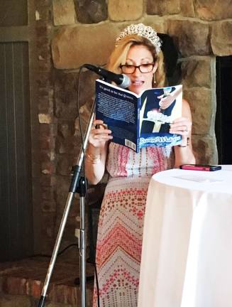Local attorney releases second novel in fantasy series Lauren Fraser reading from her latest novel.