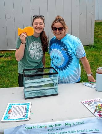 Photos: Earth Day Fair Erin Vreeland and Sue Desautels with a container of fresh water.