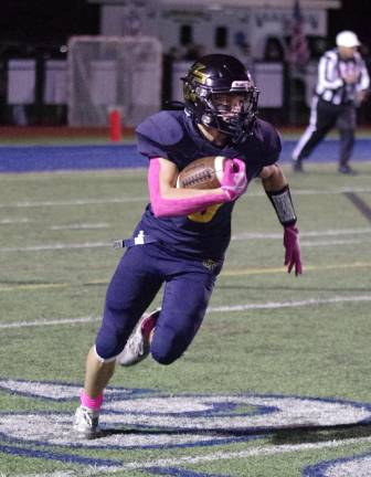Sparta tops Jefferson, 54-35 Jefferson's wideout C.J. Paskas carries the ball during a play.